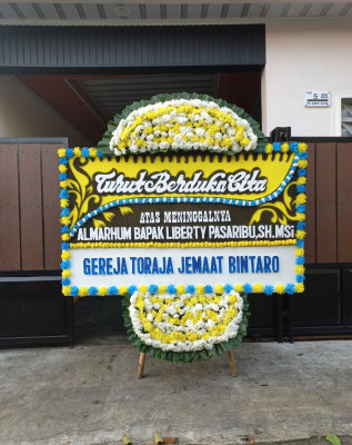 Papan Bunga Duka di Petonjangan